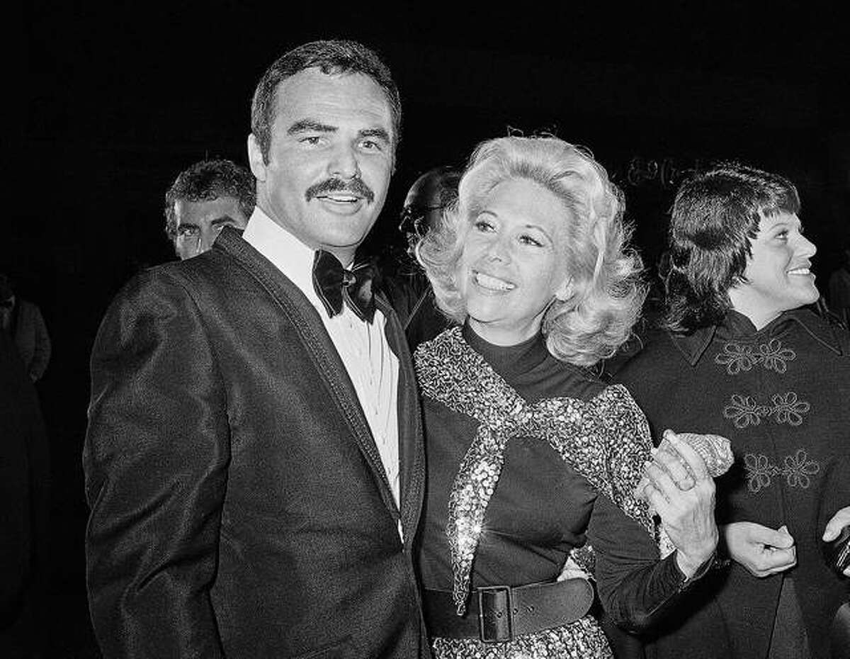 In this Nov. 5, 1971 file photo, actress Dinah Shore and Burt Reynolds appear together in Los Angeles. Reynolds, who starred in films including “Deliverance,” “Boogie Nights,” and the “Smokey and the Bandit” films, died at age 82, according to his agent.