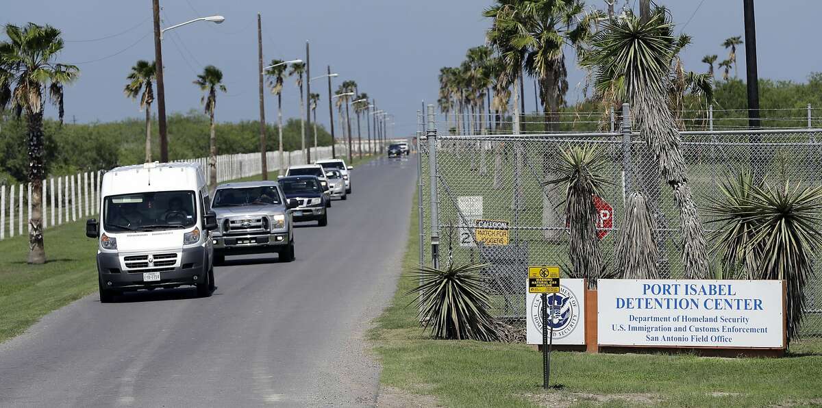 FILE - In this June 26, 2018, file photo, vehicles leave the Port Isabel Detention Center, which holds detainees of the U.S. Immigration and Customs Enforcement in Los Fresnos, Texas. The Trump administration said Sept. 6, it is abandoning a longstanding court settlement that limits how long immigrant children can be kept locked up, and it is proposing new regulations that would let the government detain families until their immigration cases are decided. (AP Photo/David J. Phillip, file)
