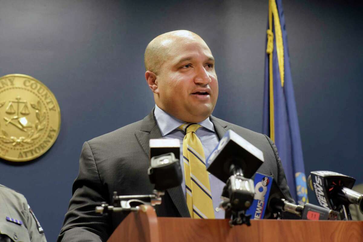 Albany County District Attorney David Soares, at podium, addresses those gathered for a press conference on a drug arrest case at the Albany County District Attorney's office on Monday, Oct. 23, 2017, in Albany, N.Y. (Paul Buckowski / Times Union)