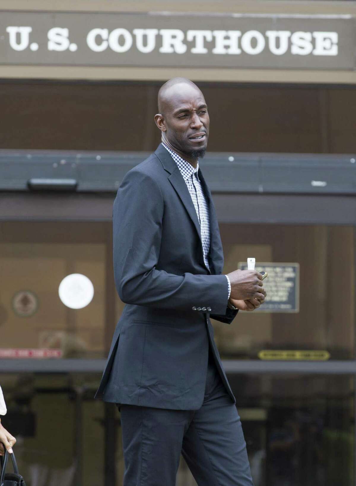 Former NBA star Kevin Garnett leaves the federal courthouse in San Antonio in June 2017 after attending a hearing in Tim Duncan’s legal case against Duncan’s former financial adviser Charles Banks. A lawsuit against Garnett’s former accountant says the retired player learned of financial losses after Banks was sentenced to four years in federal prison defrauding more than $7 million from Duncan.