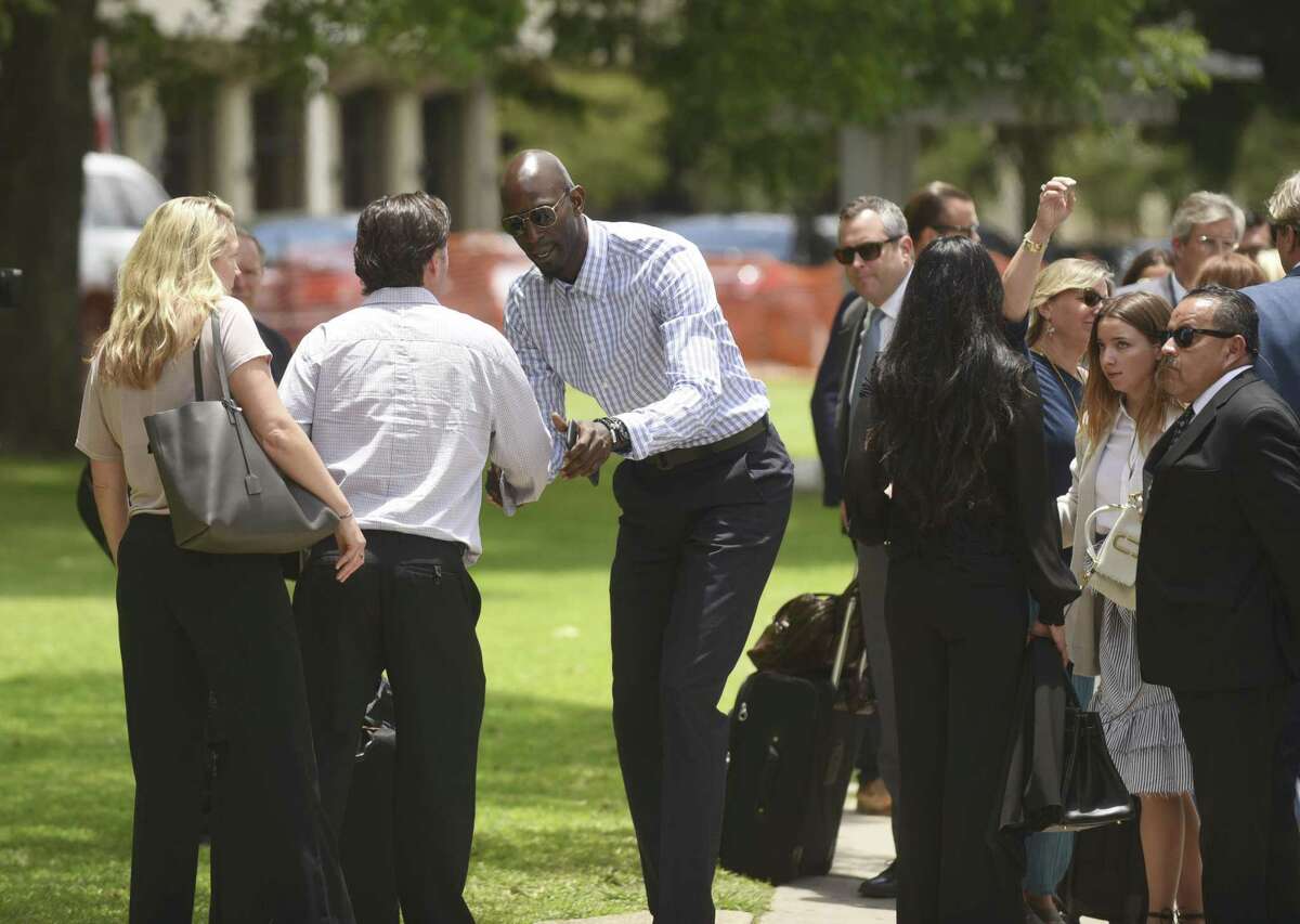 Former NBA player Kevin Garnett shakes hands with people after leaving the U.S. Federal Courthouse in San Antonio in this June 2017 photo.