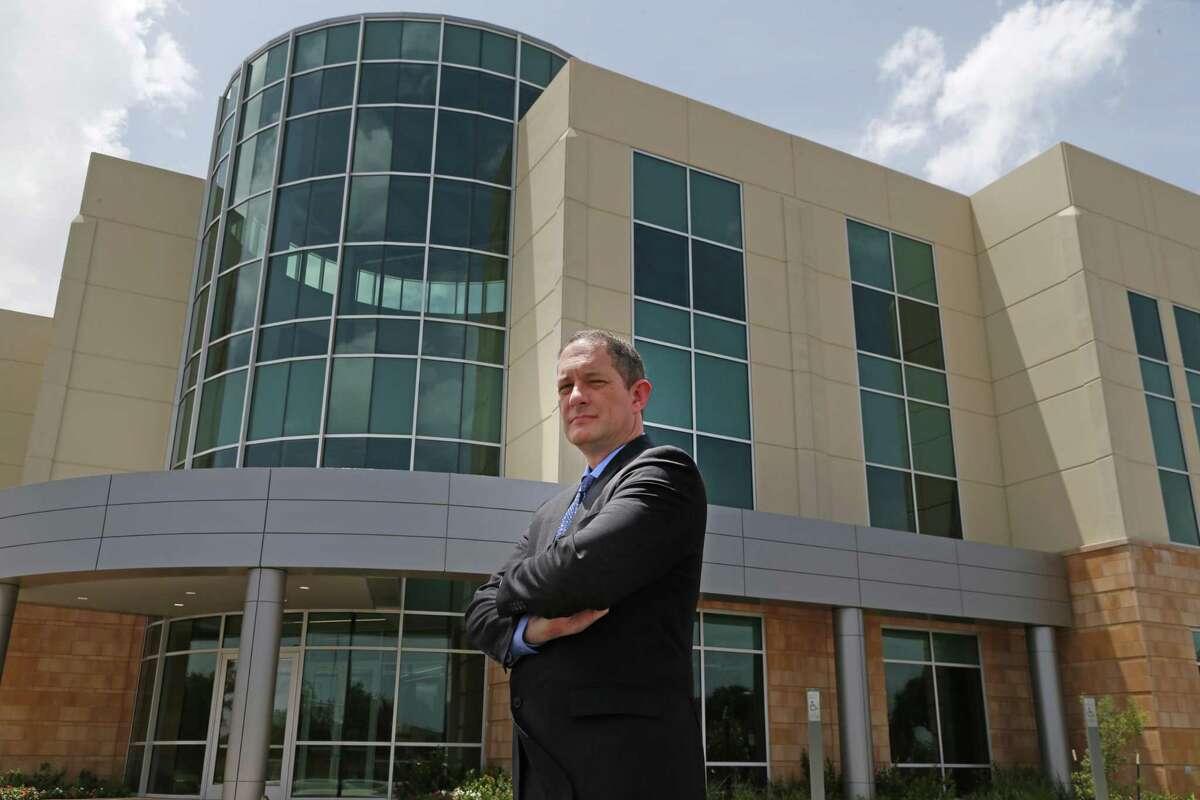 Port San Antonio CEO Jim Perschbach poses in front of the new “Project Tech” cybersecurity office space building. Photos taken on Monday, Aug.13, 2018.