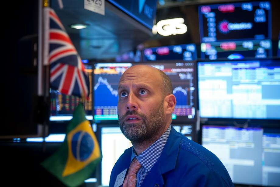 A trader is working on the New York Stock Exchange, where trade tensions have put emerging markets under pressure. Photo: Michael Nagle / Bloomberg