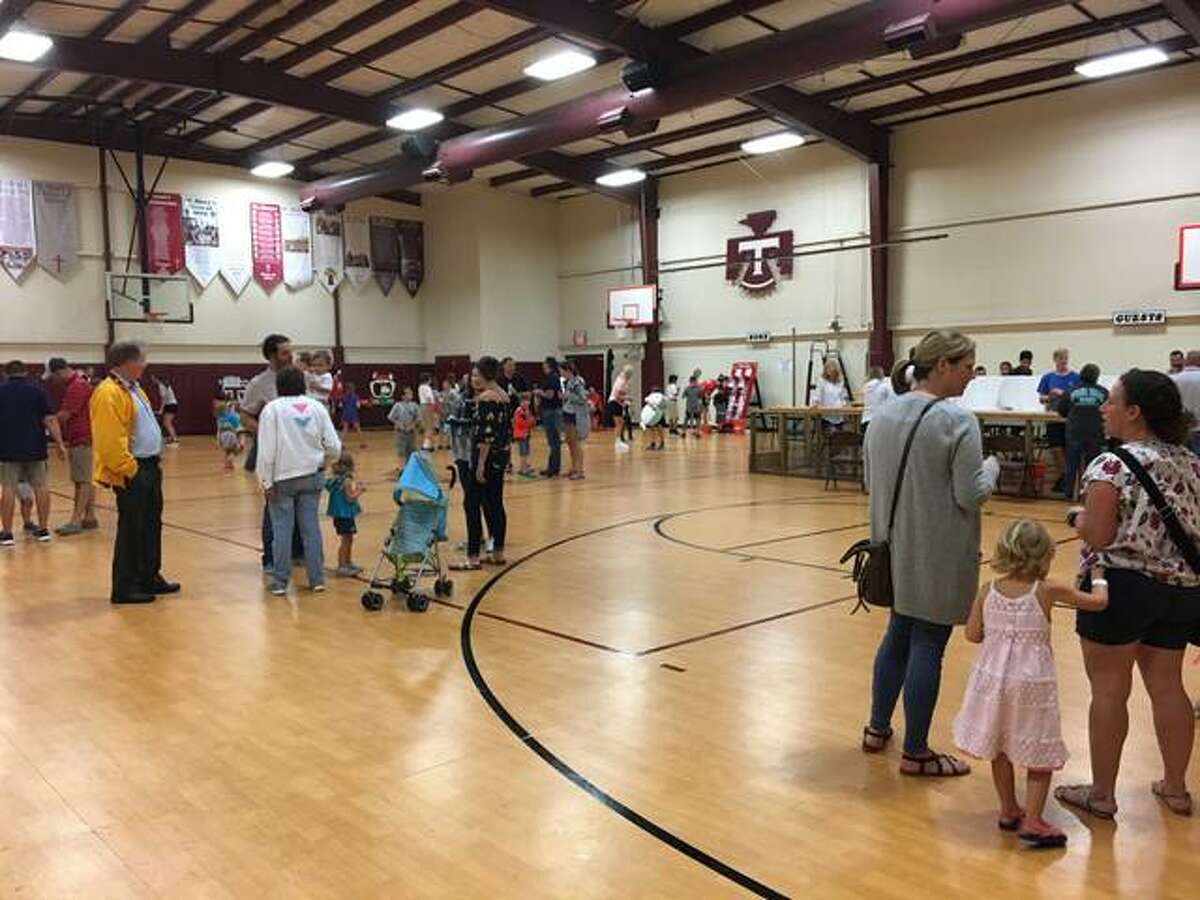 Indoors and out, the fun didn’t stop at St. Mary’s Fall Fest on Friday because of the persistent rain.