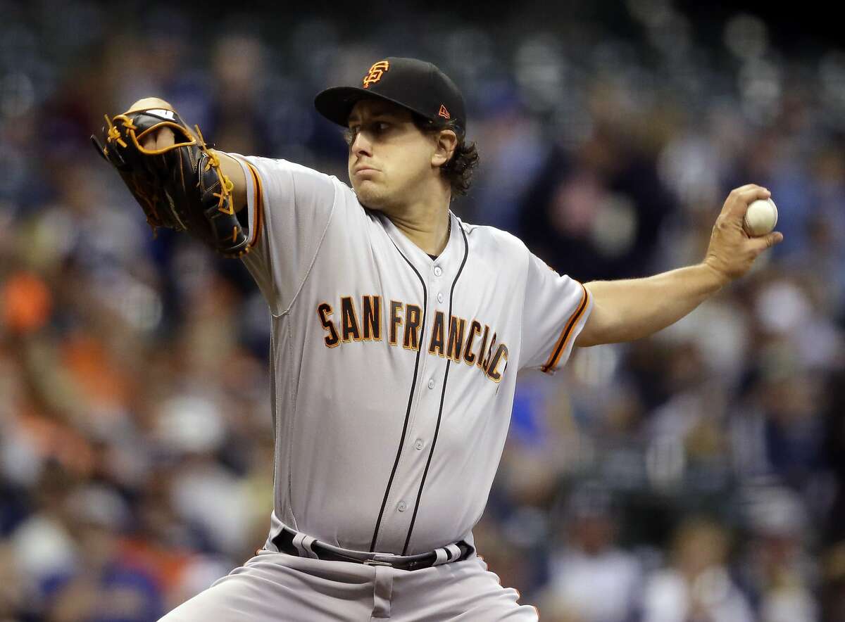 San Francisco Giants starting pitcher Derek Holland throws to the Milwaukee Brewers during the first inning of a baseball game Friday, Sept. 7, 2018, in Milwaukee. (AP Photo/Jeffrey Phelps)