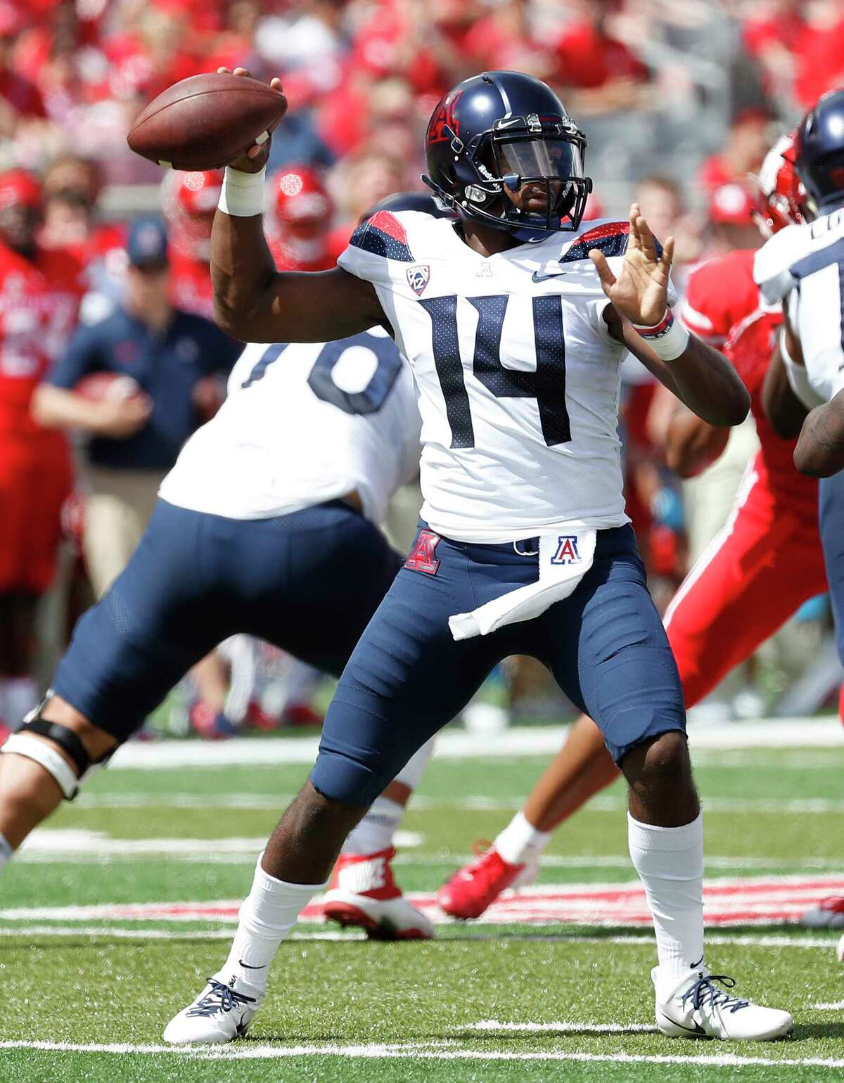 7. University of Arizona Wildcats These are really nice – especially the helmets. It's a shame that they've abandoned the gradient numbers from a few years back, particularly on such a simple uniform. Still, there's not much to gripe about here. 