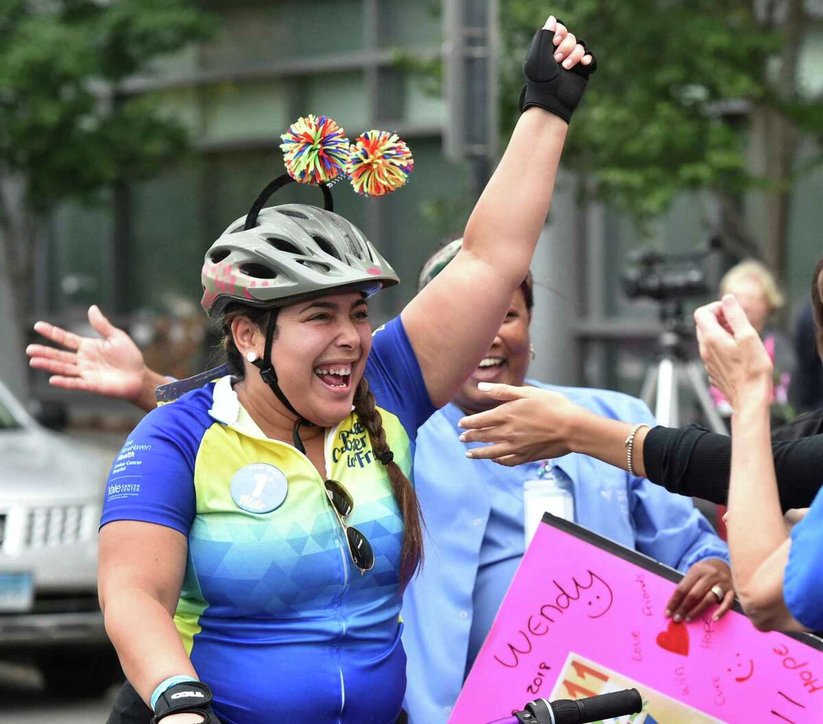 New Haven, Connecticut -Saturday, September 8, 2018: Over 1,800 bicyclists participate in the 8th Annual Closer to Free Ride fundraiser to benefit Smilow Cancer Hospital at Yale New Haven. Starting at Yale Bowl in New Haven to the YNHH Smilow Cancer Center in New Haven for the "Smilow Salute", the bicyclists then take one of five professionally-designed and fully supported routes based on the different skill levels of the riders. One hundred percent of the funds raised by riders will go to research and care at Smilow Cancer Hospital and Yale Cancer Center. One hundred percent of the funds raised by riders will go to research and care at Smilow Cancer Hospital and Yale Cancer Center. Riders return to Yale Bowl to the Finish Line Festival fun that offers live music, family activities, massage, a Food Truck Village and more. The routes take the riders through towns like Branford, Chester, Clinton, Deep River, Durham, Essex, Hamden, Guilford, Madison, Wallingford, Branford, North Haven, Old Saybrook and Westbrook.