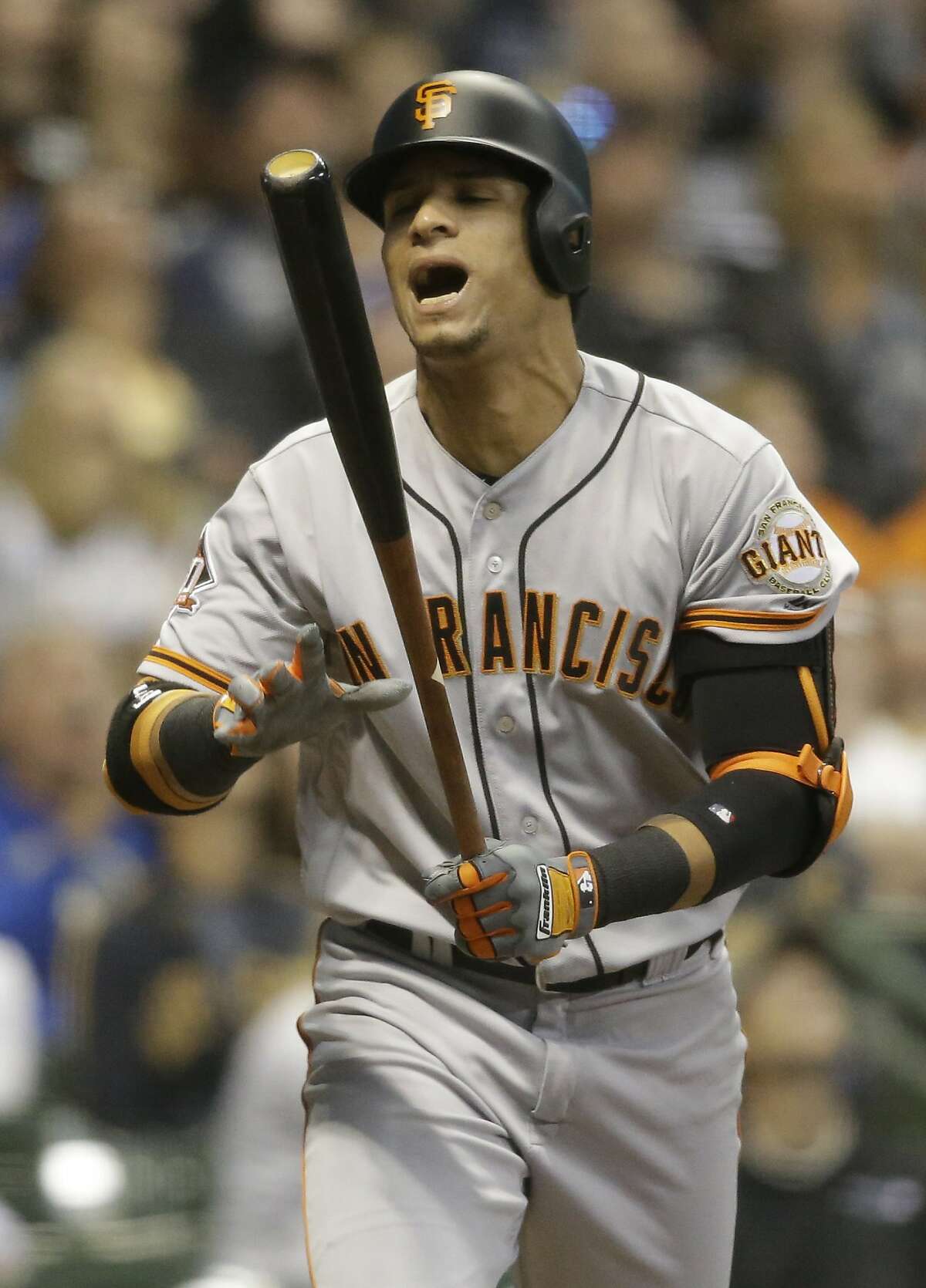 San Francisco Giants' Gorkys Hernandez reacts after popping out in the infield against the Milwaukee Brewers during the fifth inning of a baseball game, Saturday, Sept. 8, 2018, in Milwaukee. (AP Photo/Jeffrey Phelps)
