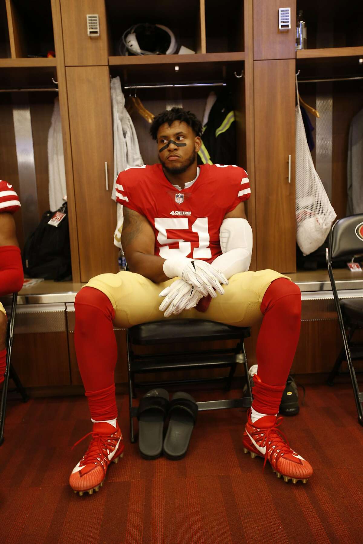 SANTA CLARA, CA - AUGUST 9: Malcolm Smith #51 of the San Francisco 49ers sits in the locker room prior to the game against the Dallas Cowboys at Levi Stadium on August 9, 2018 in Santa Clara, California. The 49ers defeated the Cowboys 24-21. ~~
