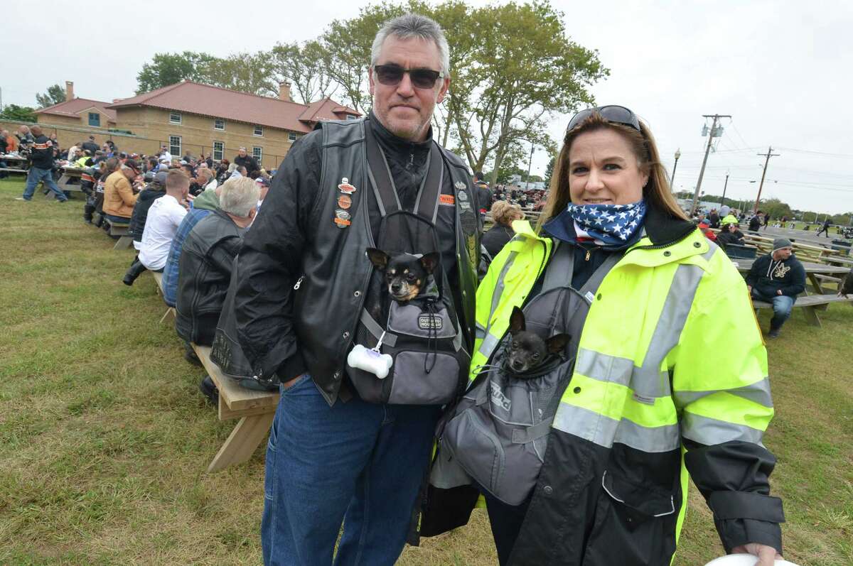 Shelton's Michael and Mary Allegrini made the ride with their dogs Harley and Zoe at the finish in Seaside Park of the 18th Annual CT United Ride on Sunday September 9, 2018 in Bridgeport Conn. Almost 2,000 motorcycle riders took part in Connecticut's largest annual 9/11 tribute riding from Norwalk through Fairfield County to Bridgeport's Seaside Park