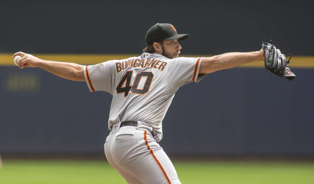 San Francisco Giants' Madison Bumgarner pitches against the Milwaukee Brewers during the first inning of an baseball game Sunday, Sept. 9, 2018, in Milwaukee. (AP Photo/Darren Hauck)