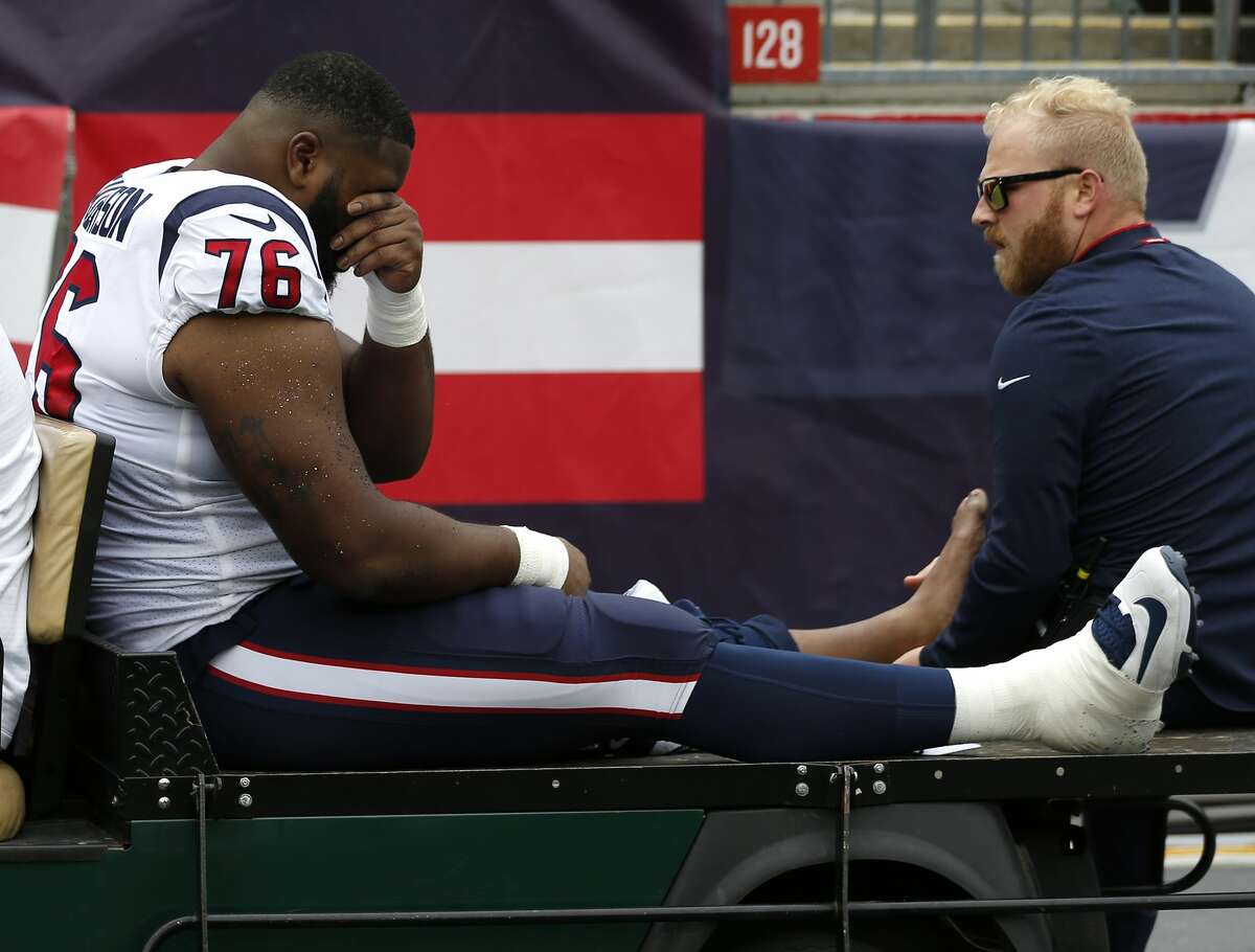 Houston Texans offensive tackle Seantrel Henderson (76) is taken from the field after suffering an injury during the first quarter of an NFL football game at Gillette Stadium against the New England Patriots on Sunday, Sept. 9, 2018, in Foxborough, Mass.