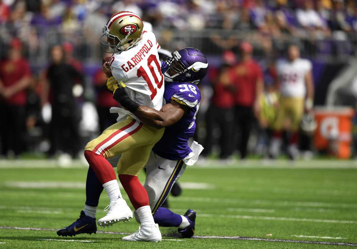 49ers' Richard Sherman has injury scare, intercepts Garoppolo