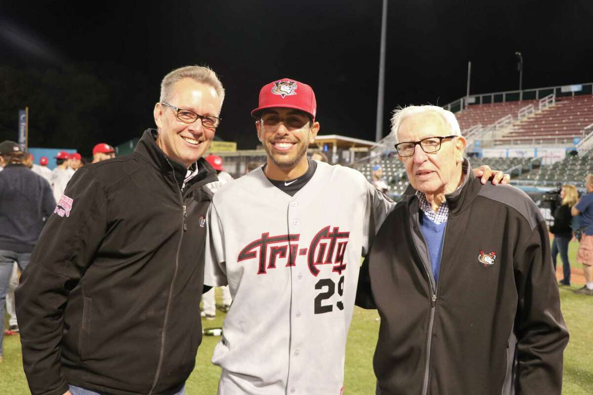 Rick Murphy, COO, left, manager Jason Bell, and Bill Gladstone, President / Principal Owner, right, celebrate the ValleyCats winning the New York-Penn League championship. (Chris Chenes / Tri-City ValleyCats Baseball)