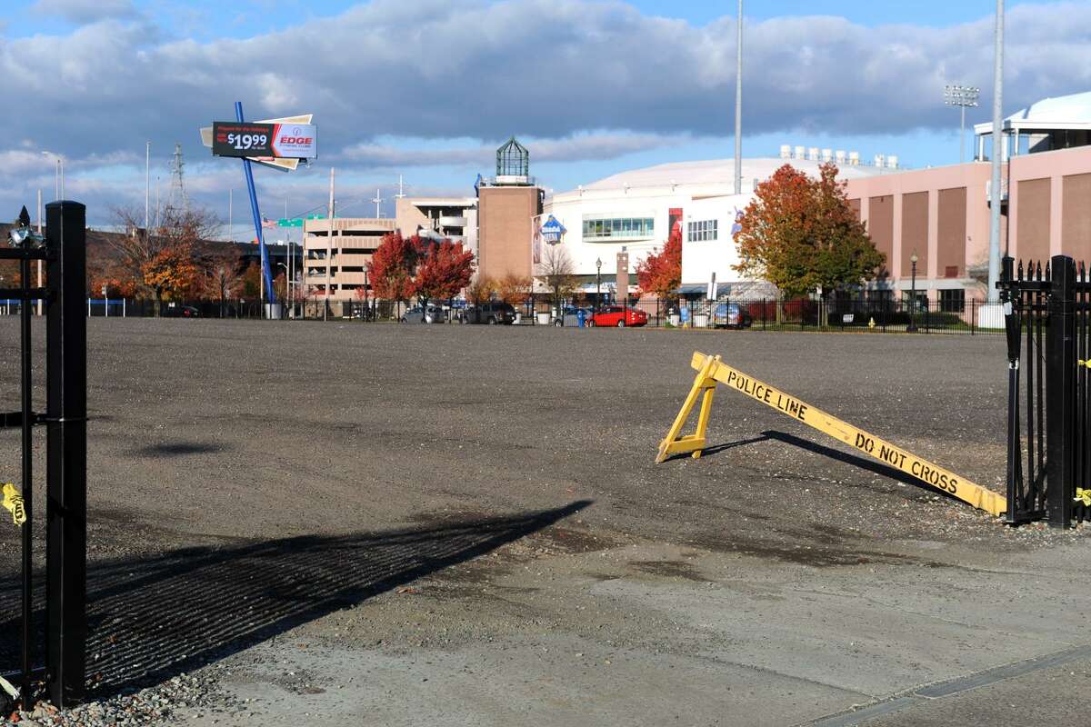 One of the two empty lots, between Lafeyette and Broad Streets, that belong to the Bridgeport Housing Authority, in Bridgeport, Conn. Nov. 14, 2014. Once the site of the Pequonnock Apartments, a public housing complex, the lots have been used for parking for the Webster Bank Arena and former Ballpark at Harbor Yard.