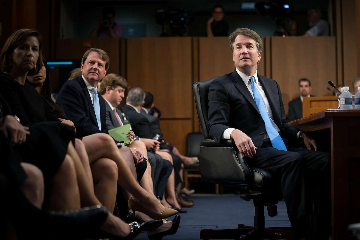 Judge Brett Kavanaugh, President Donald Trump's Supreme Court nominee, watches a video of himself during his Senate Judiciary Committee confirmation hearing, on Capitol Hill in Washington, Sept. 5, 2018. Kavanaugh studied earlier confirmation hearings carefully, as he had absorbed all of their key lessons: Say nothing, say it at great length, and then say it again. (Erin Schaff/The New York Times)
