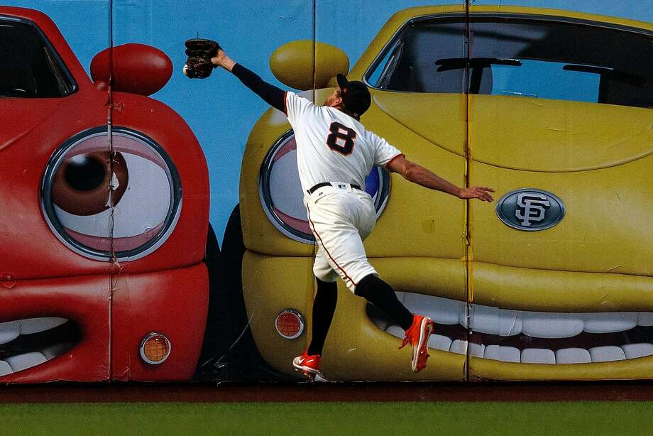 SAN FRANCISCO, CA - SEPTEMBER 10: No. 8 San Francisco Giants Hunter Pence jumps for but is unable to catch a fly for a double by Freddie Freeman (not pictured) of the Atlanta Braves at of the first round at AT & T Park September 10, 2018 in San Francisco, California. (Photo by Jason O. Watson / Getty Images) Photo: Jason O. Watson / Getty Images