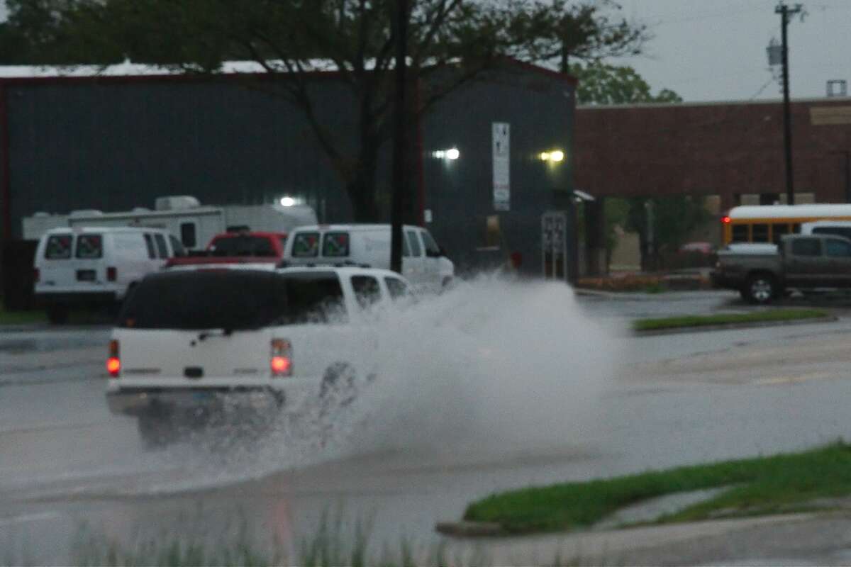 High water at Highway 3 at FM 517 slows traffic in Dickinson on Tuesday, Sept. 11, 2018. The water later cleared.