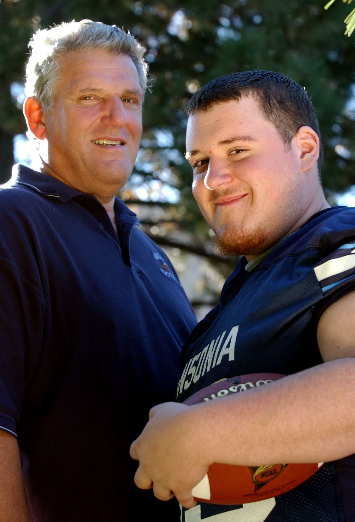 Ansonia High School football coach Jack Hunt and his son Jeff, photographed in 2005. On Friday, the practice field at Jarvis Field in Ansonia will officially be named the Jack Hunt Memorial Practice Field.