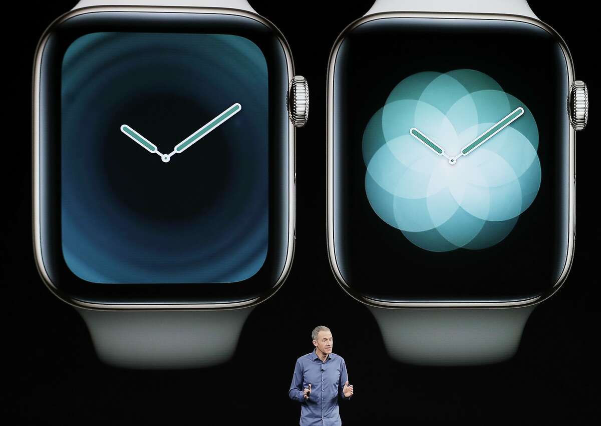 Jeff Williams, Apple's chief operating officer, speaks about the Apple Watch Series 4 at the Steve Jobs Theater during an event to announce new Apple products Wednesday, Sept. 12, 2018, in Cupertino, Calif. (AP Photo/Marcio Jose Sanchez)