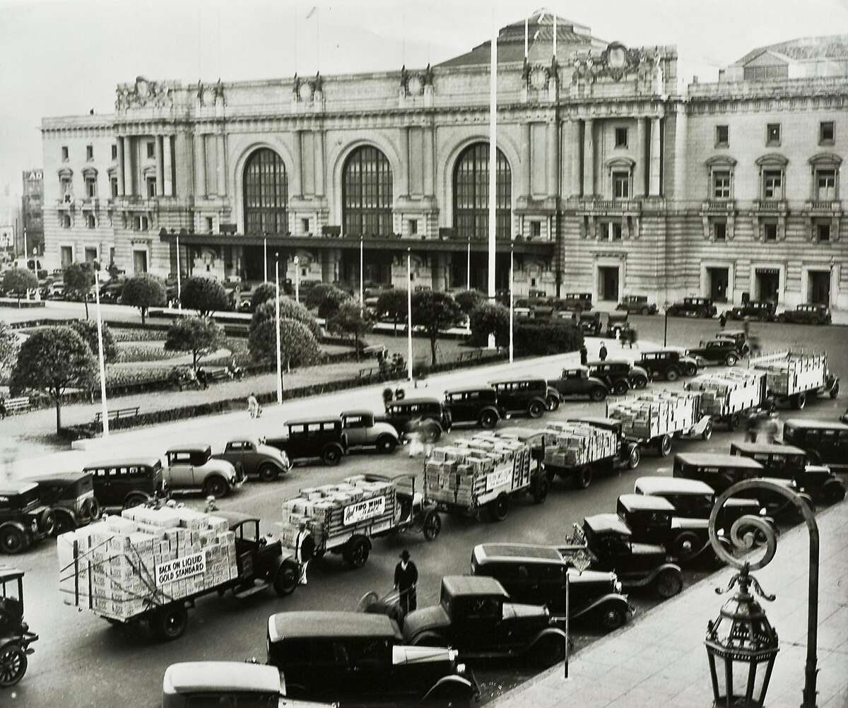 In this December, 1933 photo, Italian Swiss Colony wines returned to retail store shelves and restaurant wine lists in San Francisco as Prohibition ended. This parade of trays loaded with Tipo Chianti paused in the Civic Center of the nation's wine capital promising "free delivery" to thirsty San Franciscans.