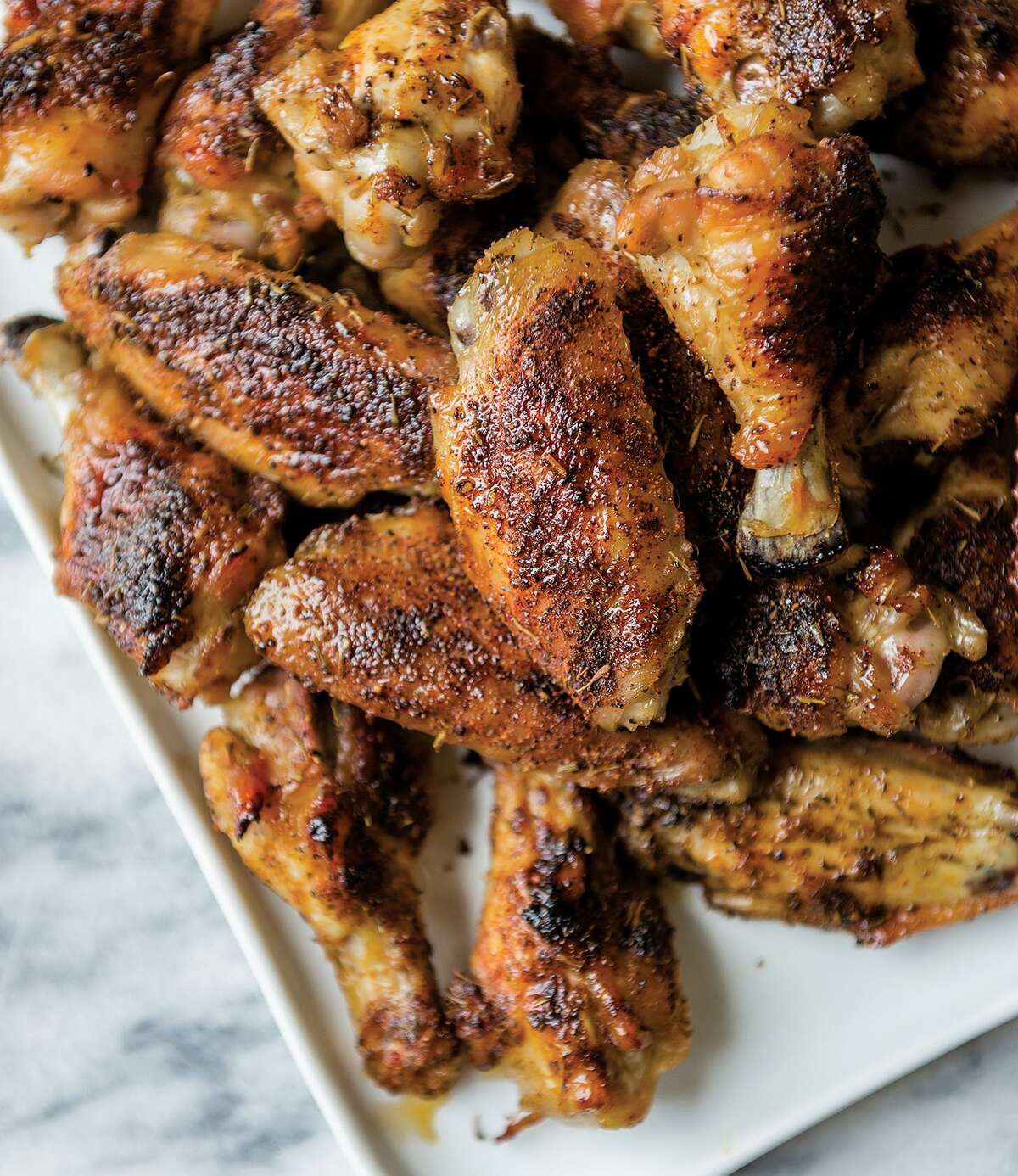 The Best Oven-Baked Chicken Wings! from ?“100 Days of Real Food: On a Budget?” by Lisa Leake (William Morrow).