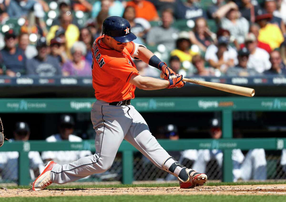 Houston Astros' Alex Bregman hits a one-run single in the third inning of a baseball game against the Detroit Tigers in Detroit, Wednesday, Sept. 12, 2018. (AP Photo/Paul Sancya)