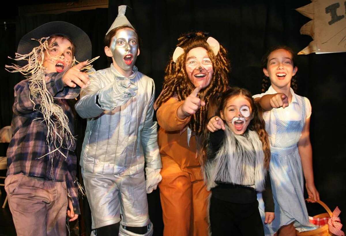 Follow the yellow brick road with, from left, Julia Rakin (of Westport) as the Scarecrow, David Hoffman (of Westport) as the Tin Man, David Littlefield (of Wilton) as the Cowardly Lion, Sydelle Bernstein (of Westport) as Toto and Liza Kottler (of Fairfield) as Dorothy in the Music Theatre of Connecticut School of Performing Arts production of The Wizard of Oz. The production will take place July 16 and 17 at Coleytown Middle School in Westport. Visit www.musictheatreofct.com or call 203-454-3883 for tickets and more information.