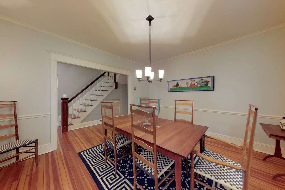 The formal dining room has chair railing.
