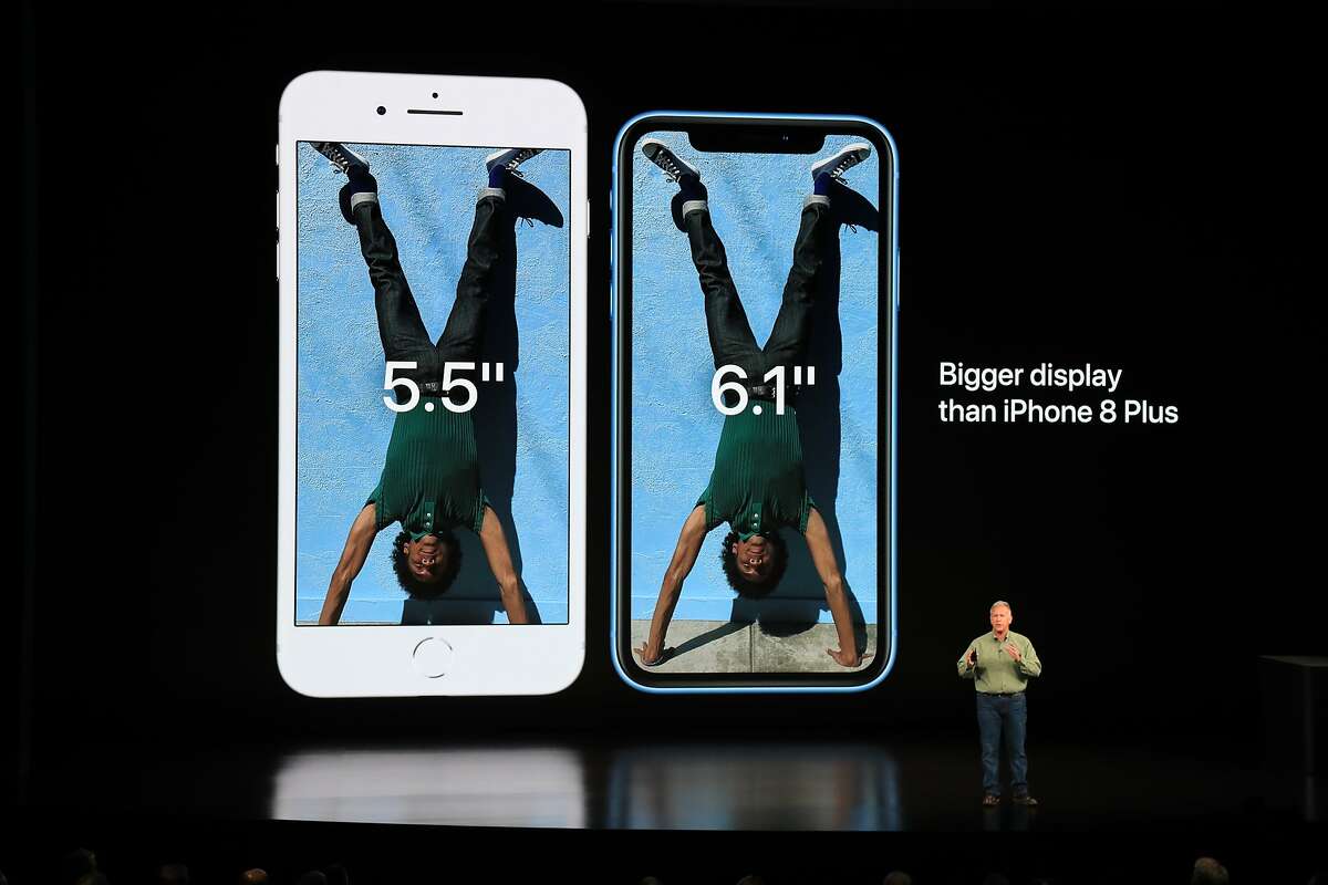 Philip Schiller, Apple�s senior vice president for marketing, shows off the new iPhone Xs and iPhoneXs Max at a new product launch event in Cupertino, Calif., Sept. 12, 2018. This is the second year that Apple is unveiling its new items at its own venue, the Steve Jobs Theater at its new spaceship headquarters in Cupertino. (Jim Wilson/The New York Times)