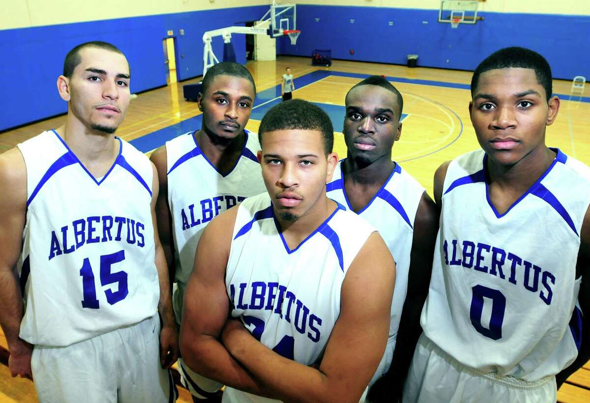 From left, Albertus Magnus College basketball players Alex Muniz Byron Reaves, Jefferson Lora, Walden St. Juste and Ray Askew in 2010.