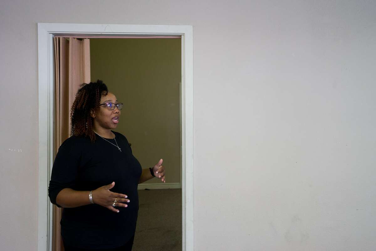 Tamisha Walker, 36, of Antioch, works at the Safe Return Project office in Pittsburg, Calif. on Wednesday, September 12, 2018. Walker, a co-founder and executive director of the Safe Return Project says her goal is to, "re-enfranchise individuals who have disenfranchised by criminalization."