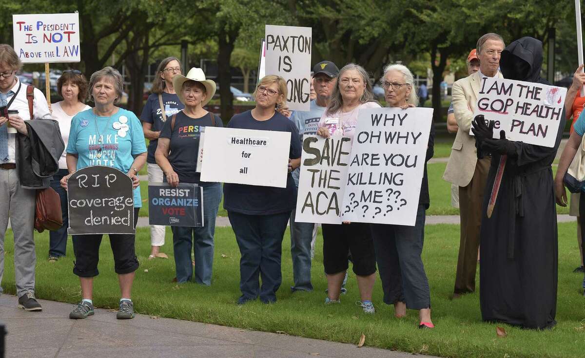 Supporters of the Affordable Care Act protest during a rally at Burnett Park in Fort Worth, Texas, Wednesday, Sept. 5, 2018. (Max Faulkner/Fort Worth Star-Telegram/TNS)