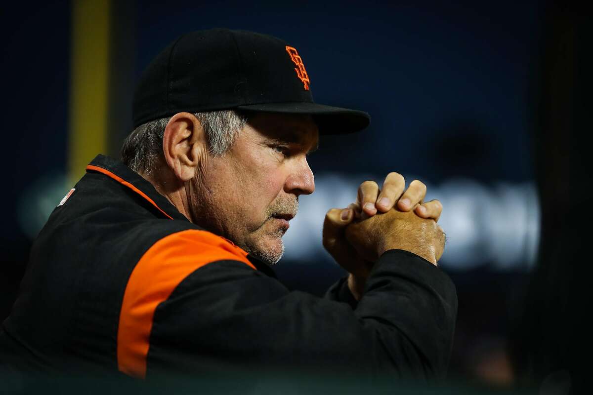 Giants' manager Bruch Bochy (15) watches the game between the San Francisco Giants and the Milwaukee Brewers at AT&T Park in San Francisco, Calif., on Tuesday, Aug. 22, 2017.