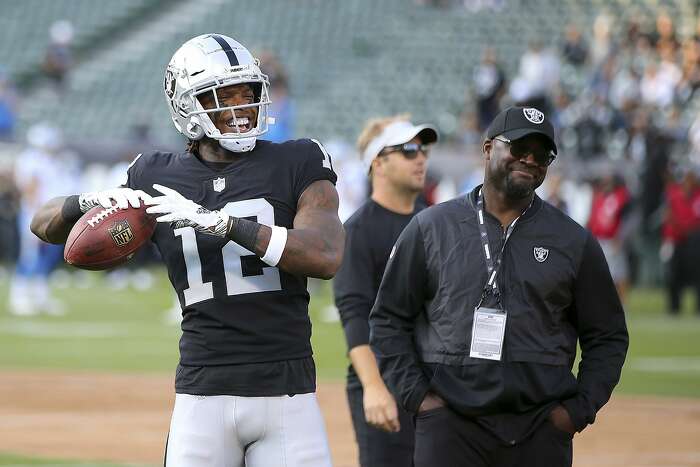 Oakland Raiders wide receiver Martavis Bryant (12) tries to break