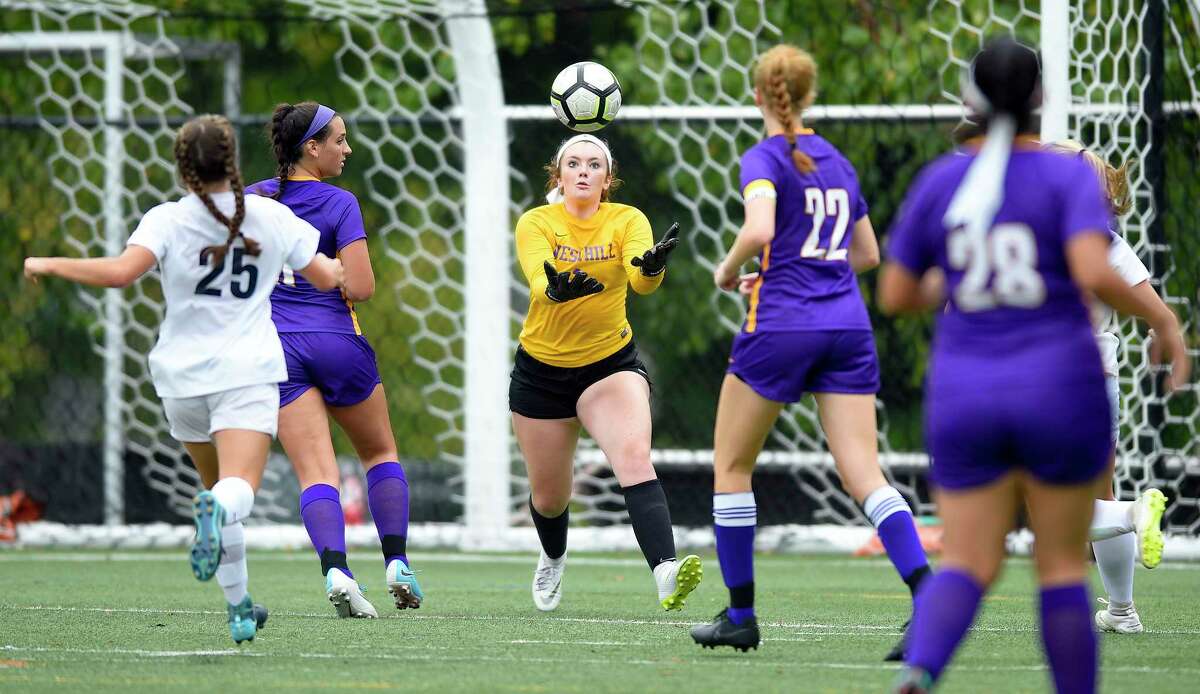 Westhill goalie Niamh Keogh (1) grabs the ball in front of the goal in a FCIAC girls soccer game against Wilton at Westhill High School on Thursday, Sept. 13, 2018 in Stamford, Connecticut. The Vikings of Westhill and the Warriors of Wilton played to a 0-0 tie.