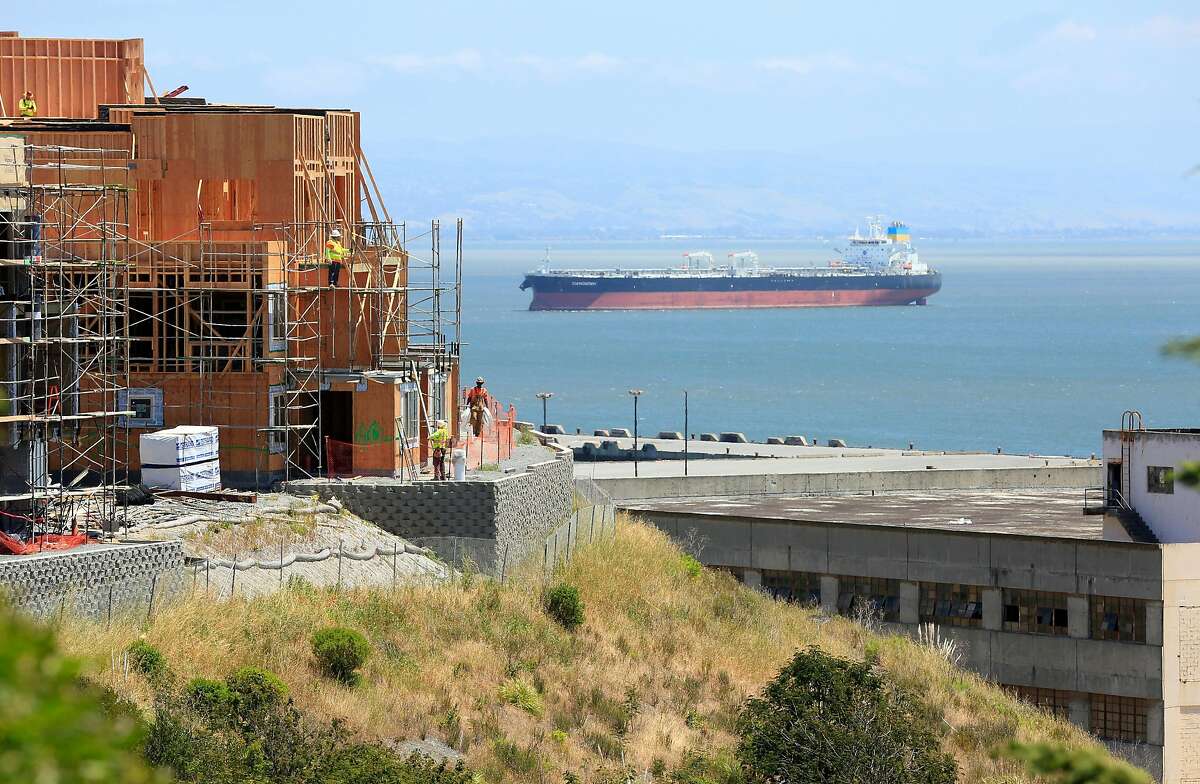 New construction on Parcel A (l to r) is seen next to structures at Hunter's Point Shipyard on Thursday, May 17, 2018 in San Francisco, Calif.