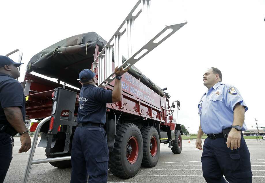 PHOTOS: Houston flood barricadesThe Houston Fire Department is preparing high-water vehicles for overnight floods expected to bring up to three inches of rain to the area. &gt;&gt;&gt; See the areas most likely to be barricaded in a flood Photo: Melissa Phillip, Staff Photographer