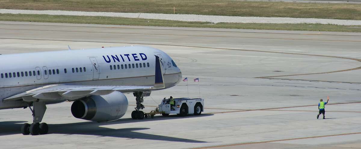 A United Airlines Boeing 757 prepares to depart from Bush Intercontinental Airport.