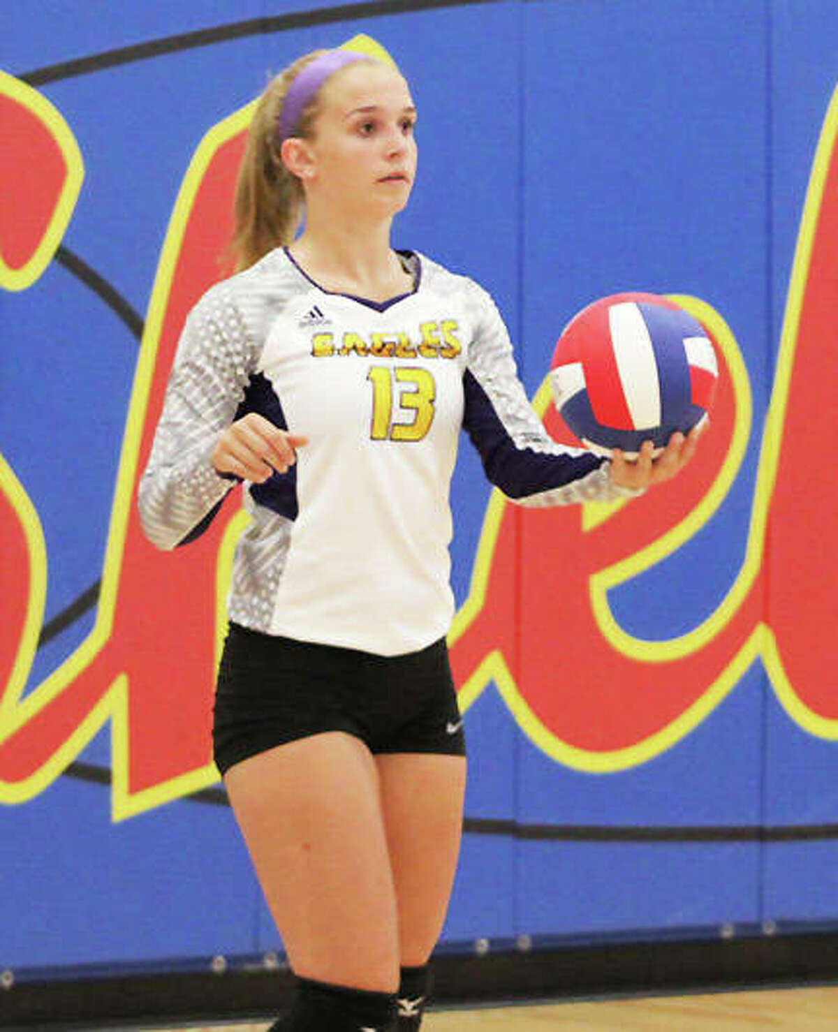 CM’s Harper Buhs serves during a match at the Roxana tournament on Aug. 21. The 8-8 Eagles dropped to 0-2 in the MVC on Thursday with a two-set home loss to Waterloo.
