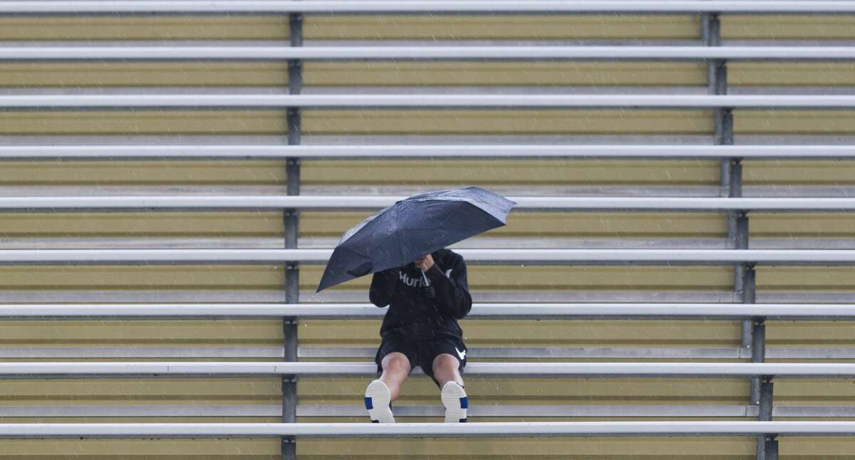 PHOTOS: Flooding photos from Tropical Depression Imelda  A Montgomery fan sits in the rain before a non-district high school football game, Thursday, Sept. 13, 2018, in Montgomery. >>>Staff photos from the effects of Imelda on Thursday, Sept. 19, 2019 ... 