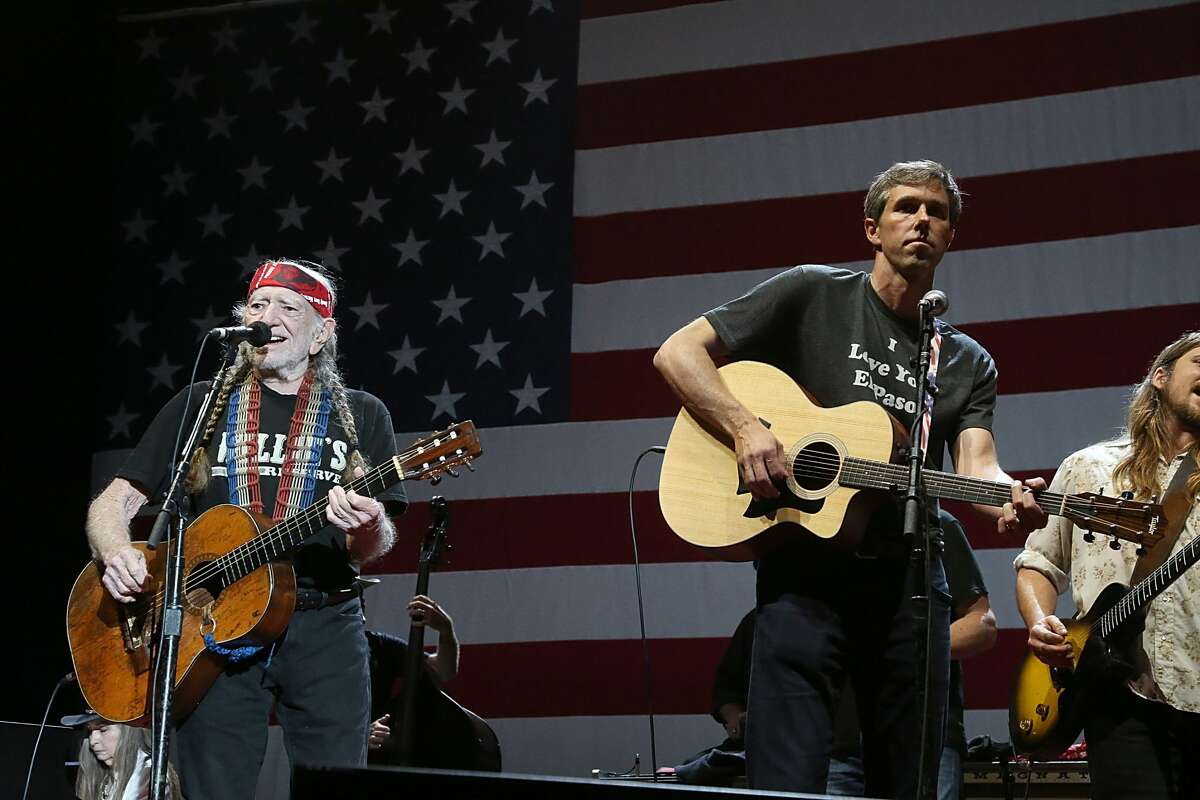 AUSTIN, TX - JULY 04: Willie Nelson (L) and Beto O'Rourke perform in concert at Willie Nelson's 45th 4th Of July Picnic at the Austin360 Amphitheater on July 4, 2018 in Austin, Texas. (Photo by Gary Miller/Getty Images for ABA)