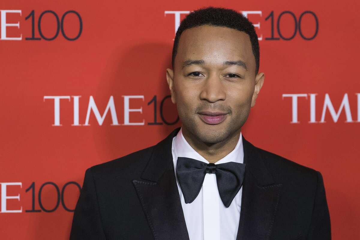 FILE- In this April 25, 2017, file photo, John Legend attends the TIME 100 Gala. Click through this gallery for historical photos of Christmas in San Francisco.