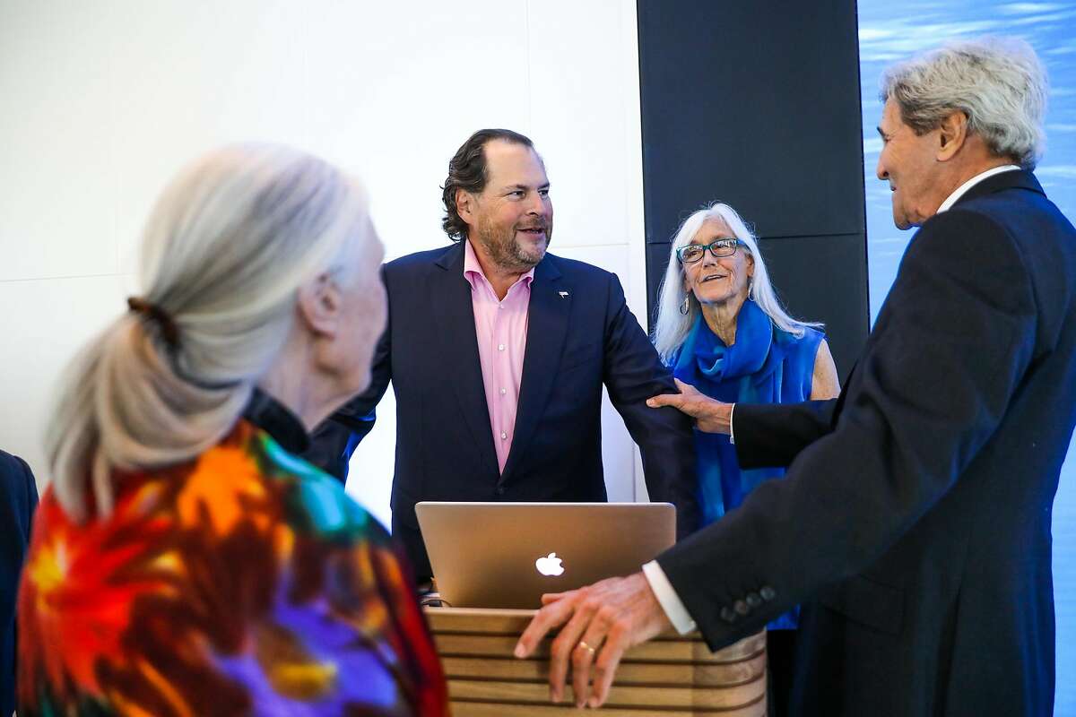 Salesforce CEO Marc Benioff (center) mingles with former Secretary of State John Kerry (right) Julie Packard (second from right) and Jane Goodall (left) at the Healthy Oceans Climate Reception at Salesforce East on Mission Street in San Francisco, California, on Thursday, Sept. 13, 2018.