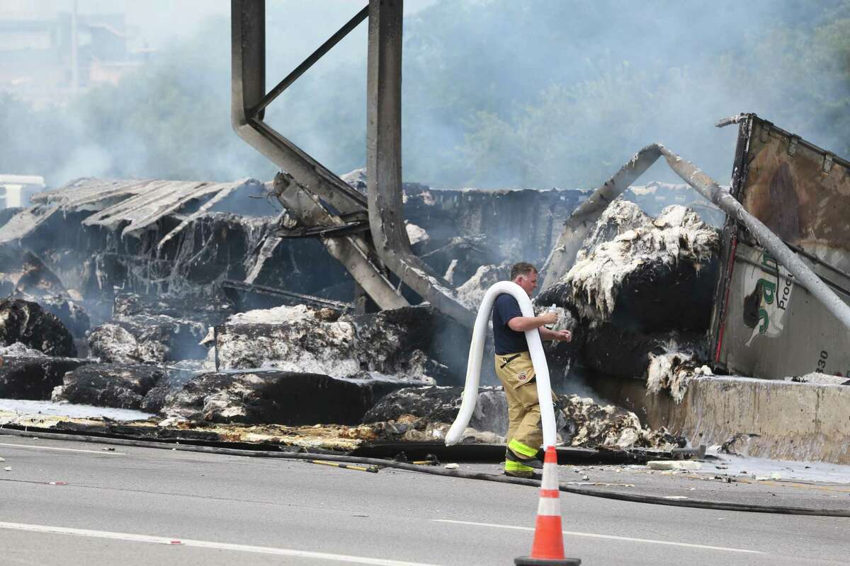 A massive fire burned on U.S. 281 near Hildebrand Avenue late Wednesday morning, shutting down the highway in both directions. An 18-wheeler caught fire there around 11:30 a.m., a police spokesperson said. Cars are being diverted onto the Hildebrand exits. Officials said the closure could last several hours.