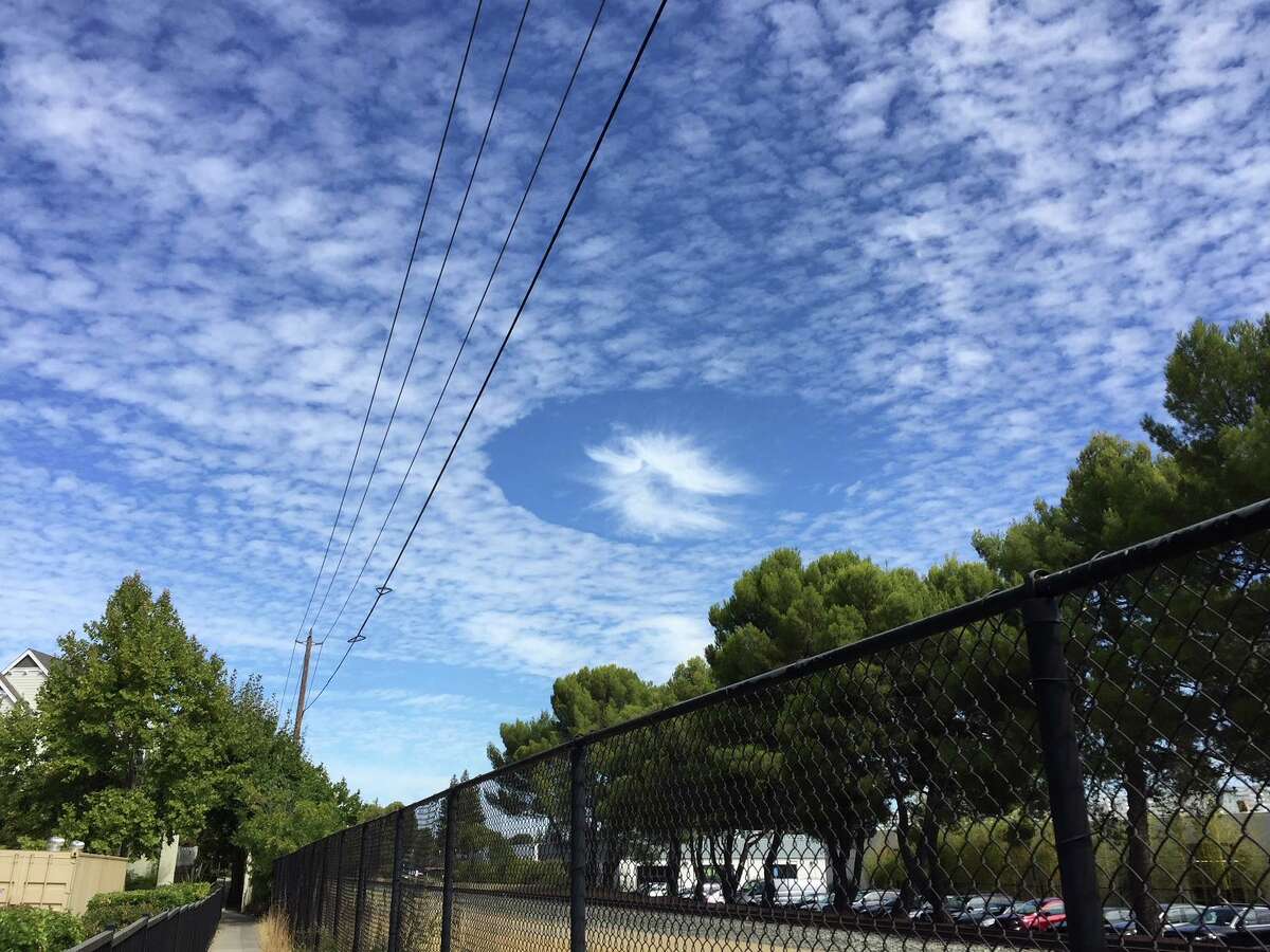 Amazing 'hole punch' phenomenon spotted in clouds over Bay Area