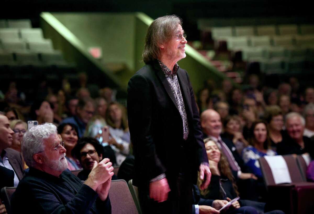 Jackson Browne stands to listen to a proclamation in his honor from the City of New Haven before accepting the Gandhi Peace Award from Promoting Enduring Peace at the Lyman Center for Performing Arts at Southern Connecticut State University in New Haven Friday.