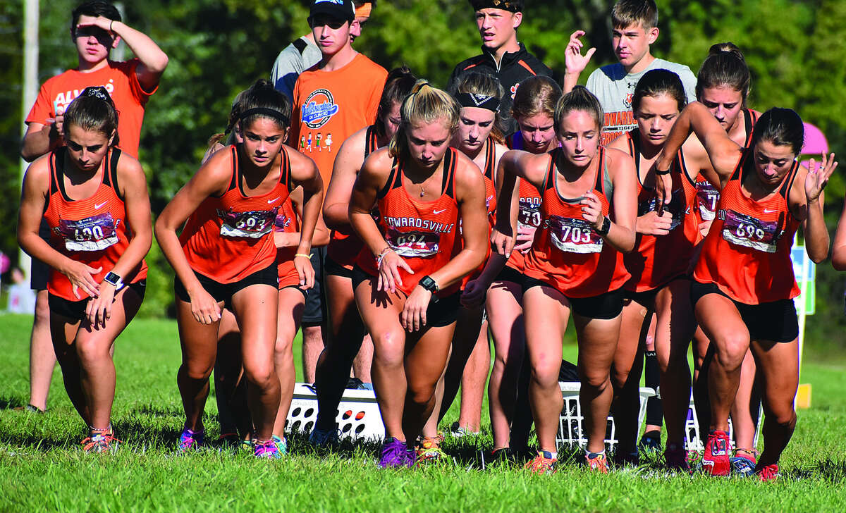 The Edwardsville girls’ cross country team begins the Edwardsville Invitational race on Saturday morning on the campus of SIUE.