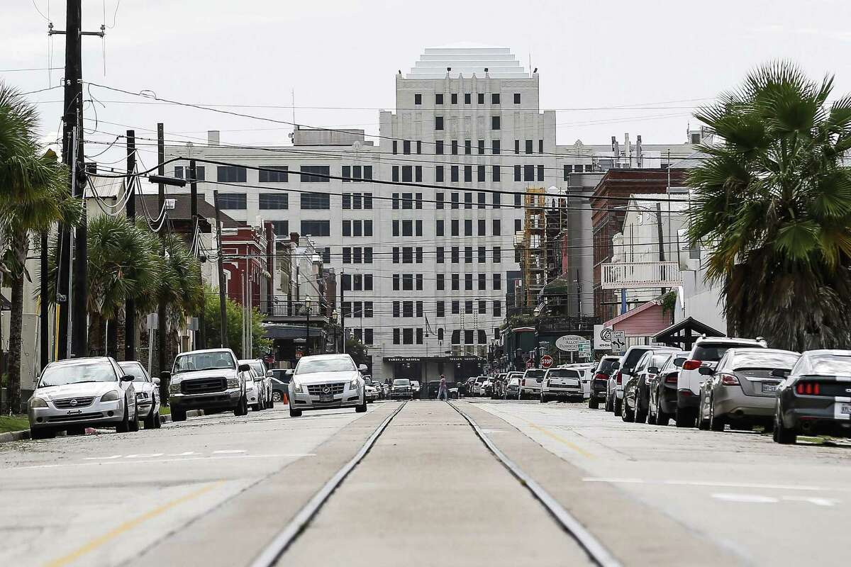Trolley tracks extend down Strand Street toward downtown Thursday Sept. 13, 2018 in Galveston ten years after Hurricane Ike hit the Texas coast.