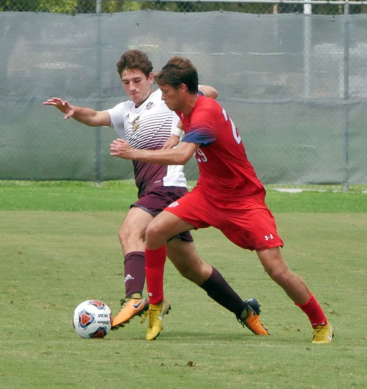 Midfielder Andres Ogaz battles for the ball for the TAMIU Dustdevils as they played Dallas Baptist University Saturday, September 15, 2018 at the TAMIU Soccer Field.